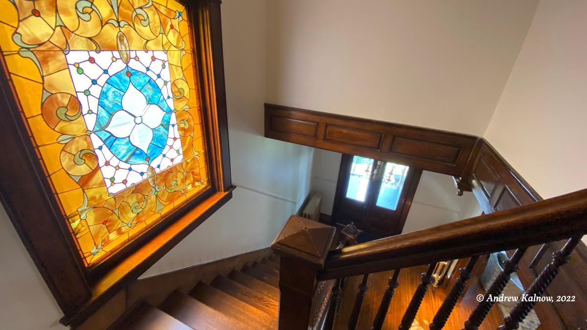 Queen Anne stairway detail, stained glass window